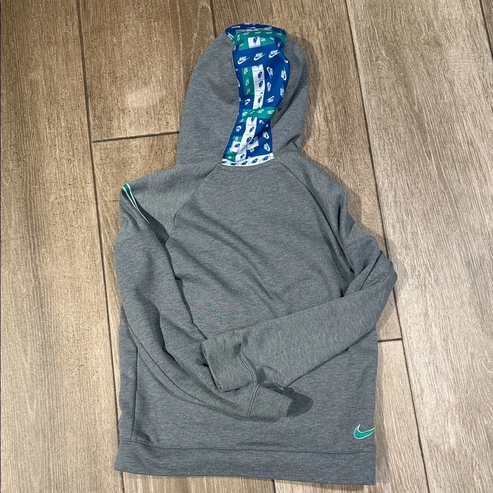 Nike Gray Kids Hoodie with Green Swoosh and Blue Hood Lining
